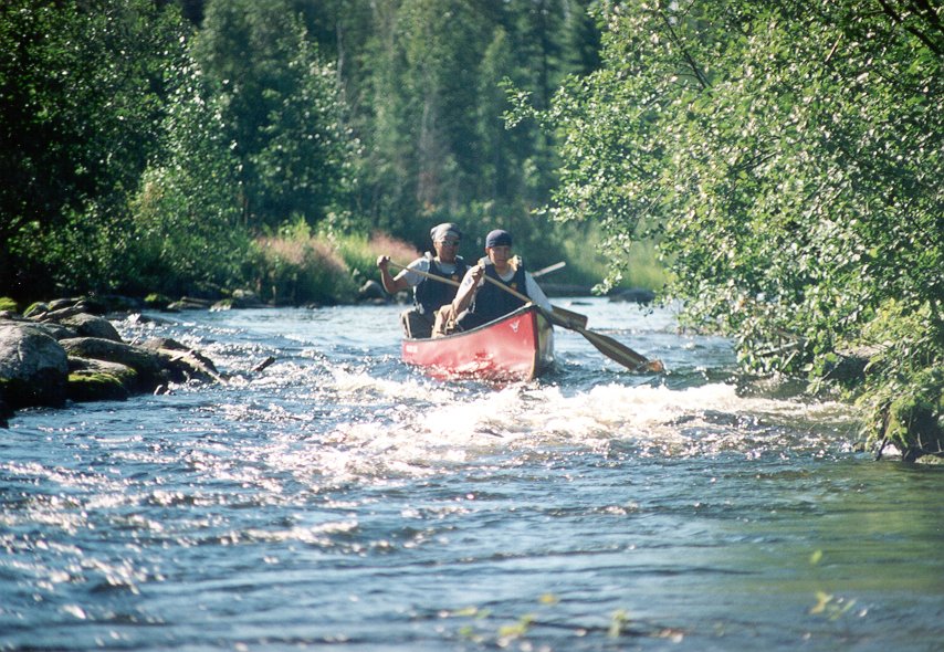 Conroy (in the bow) and Jeremy (in the stern) entering a small rapid