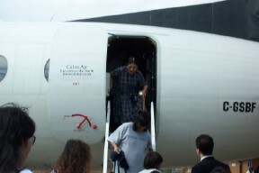 And here we have an elder just exiting the plane. She was on the first plane that landed.
