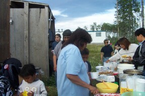 Rita serving the hungry people.