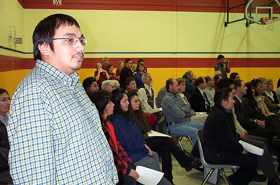 Math and Native Language Teacher Robert Morris watching the opening.